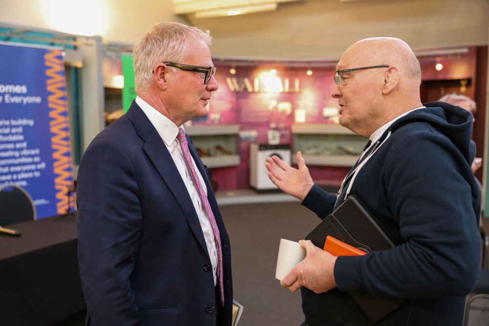 Two people engaging in conversation.