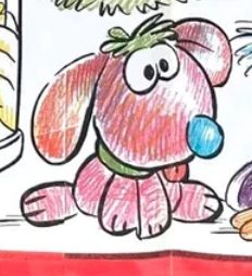 little funny muppet doggy. it’s in a sitting pose with its tongue out. it’s red, with orange ears, green collar and hair, and a blue nose!