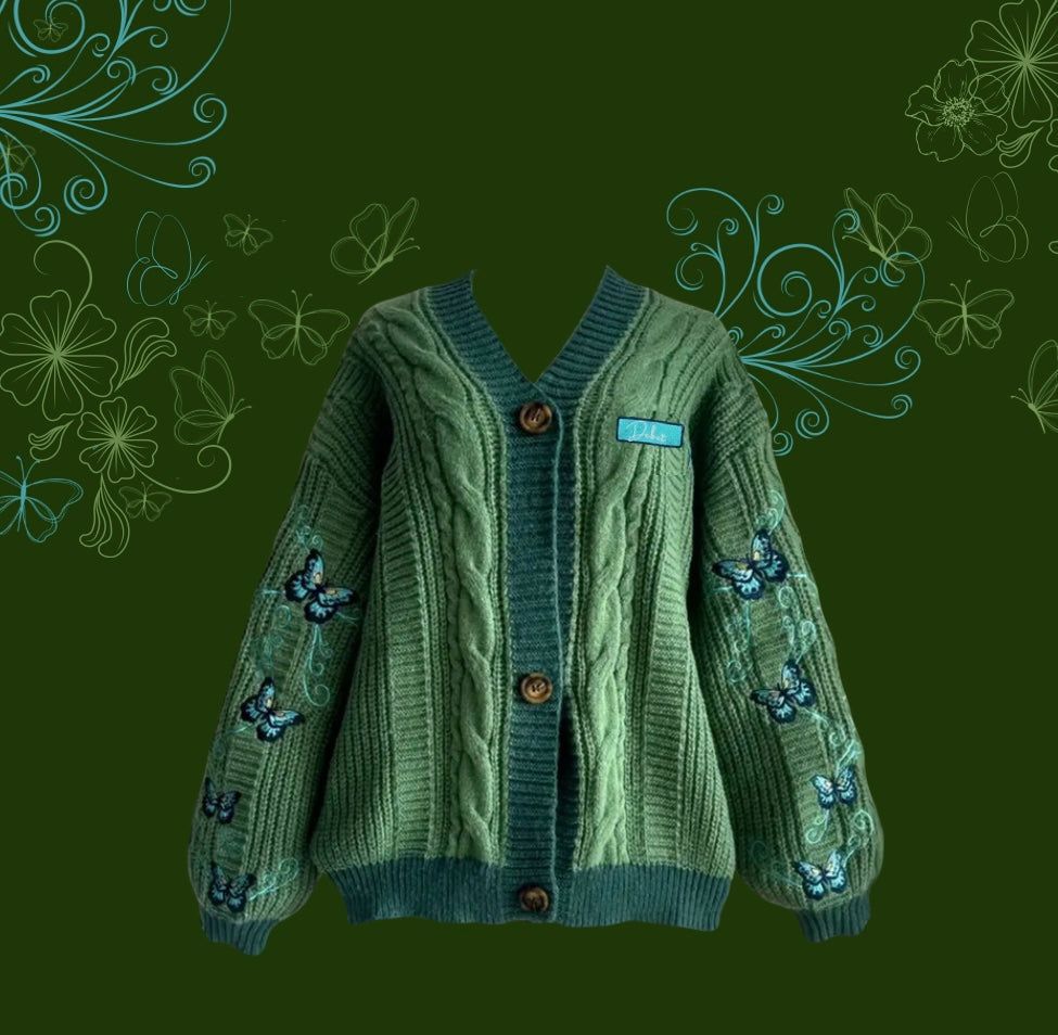 green cardigan with blue butterflies, inspired by taylor swift’s debut album.