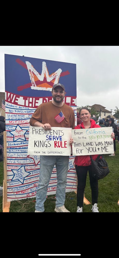 signs: 

presidents serve kings rule know the difference. 

from California to the New York islands, this land was made for YOU + ME. 
