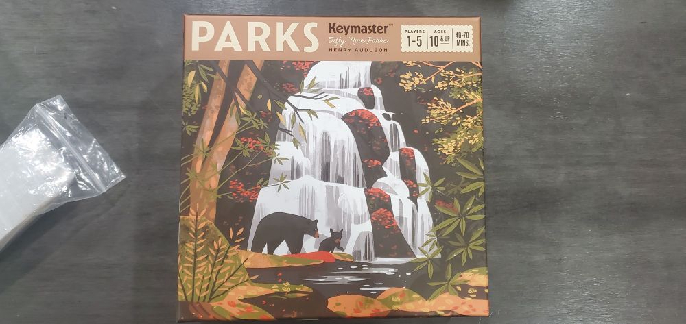 The box of the board game "parks" by keymaster Henry audubon