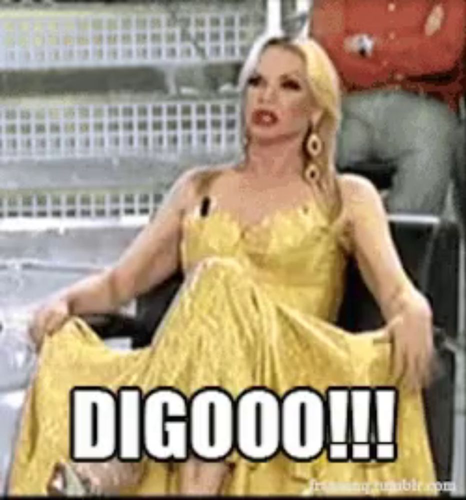 a woman in a yellow dress is sitting in a chair with her skirt up and the words digooo !!! written on the screen .