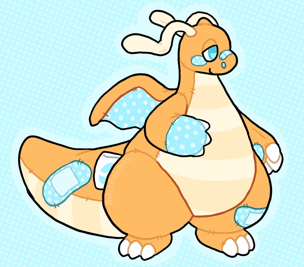 A plush dragonite design, with blue polkadot fabric on their paw, wings, cheeks, and on bandaid-shaped patches along their leg, tail, and nose.