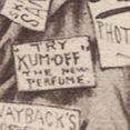 Sign says 'Try "Kum-Off" The New Perfume'