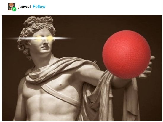 Marble statue of the god Apollo, eyes flaring with power, holding or preparing to pass along the red rubber dodgeball of prophecy 