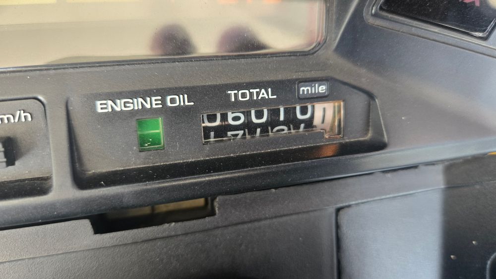 Picture of the odometer of my scooter reading "6,010.1 miles." I got my scooter at about 5,200 miles.
