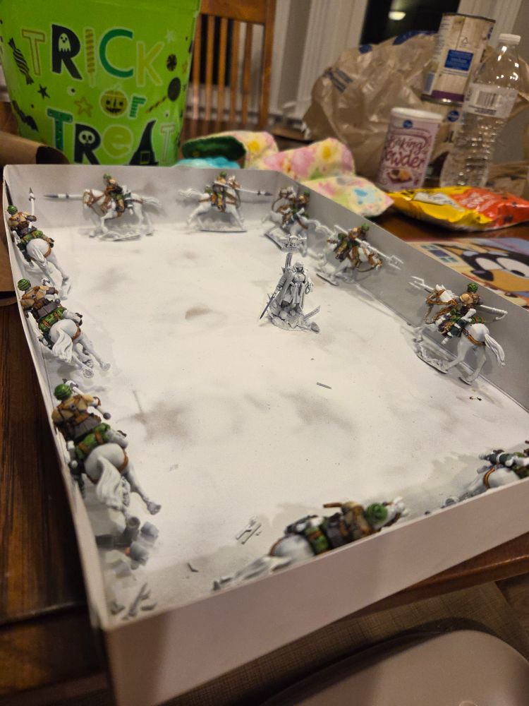 10 cadian horses in the priming box, as i continue to paint