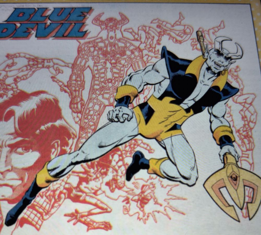 The comic book character Blue Devil in a heroic pose.  