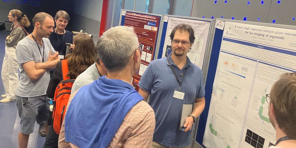 Federico Berto (postdoc, IMAGINE! consortium) presenting his poster