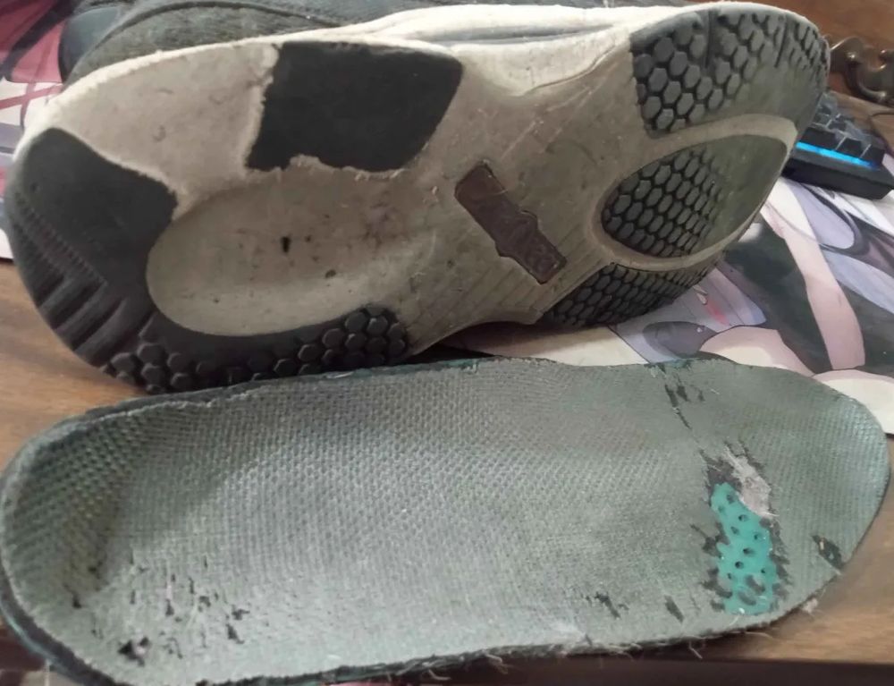 shoes are worn so thin tread is missing completely in multiple places and orthotic insert is worn thru and has holes.
