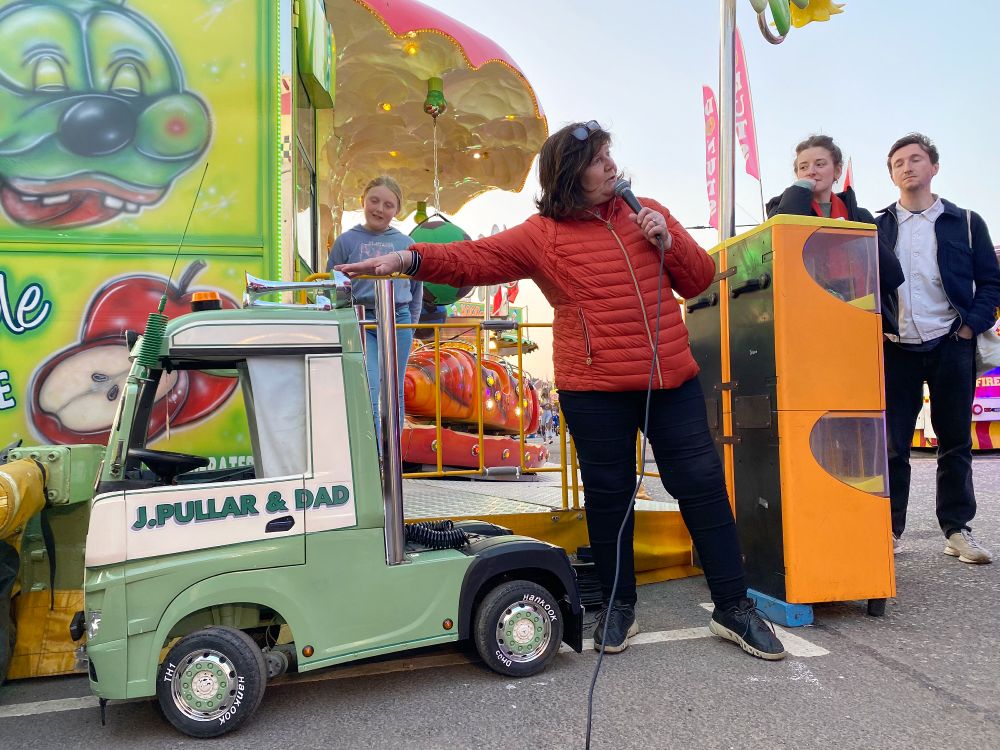 Lucille Pullar speaks on Showpeople culture and heritage at Dumfries' 2024 March Fair. Image courtesy of TS Beall