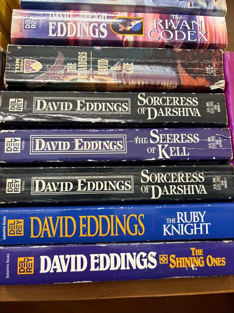 A stack of books by David Eddings