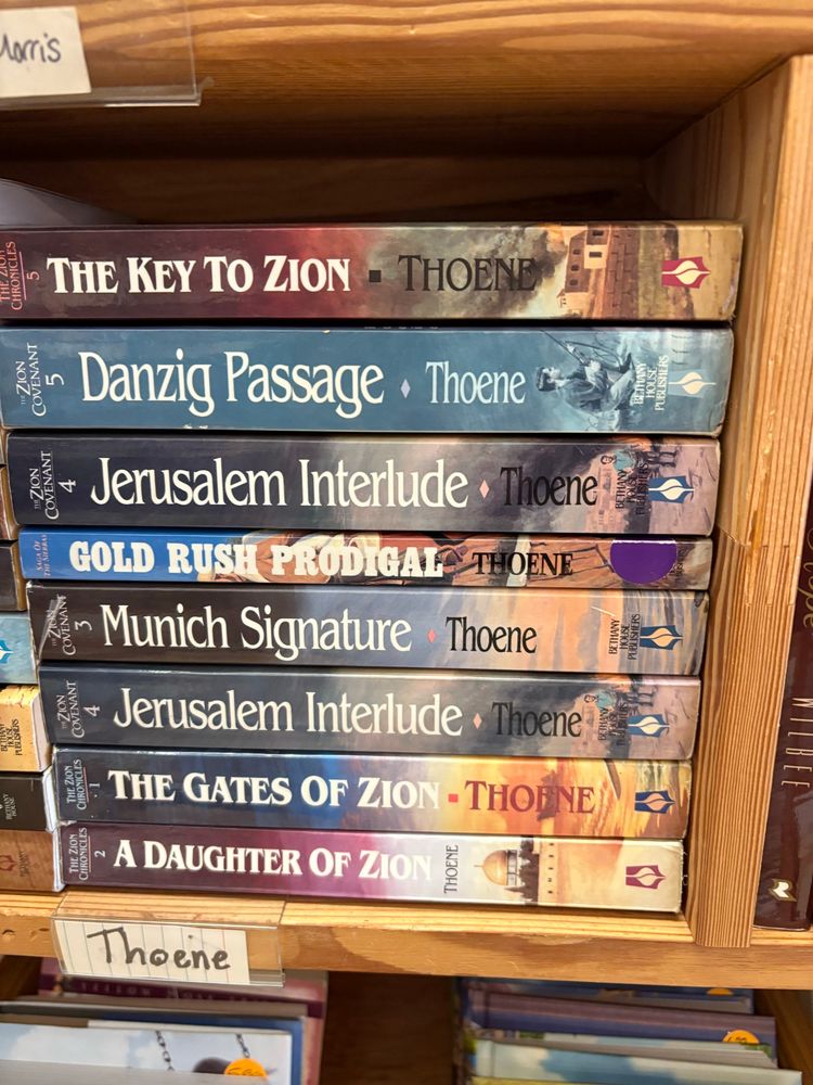 A stack of books by Brock and Bodie Thoene 