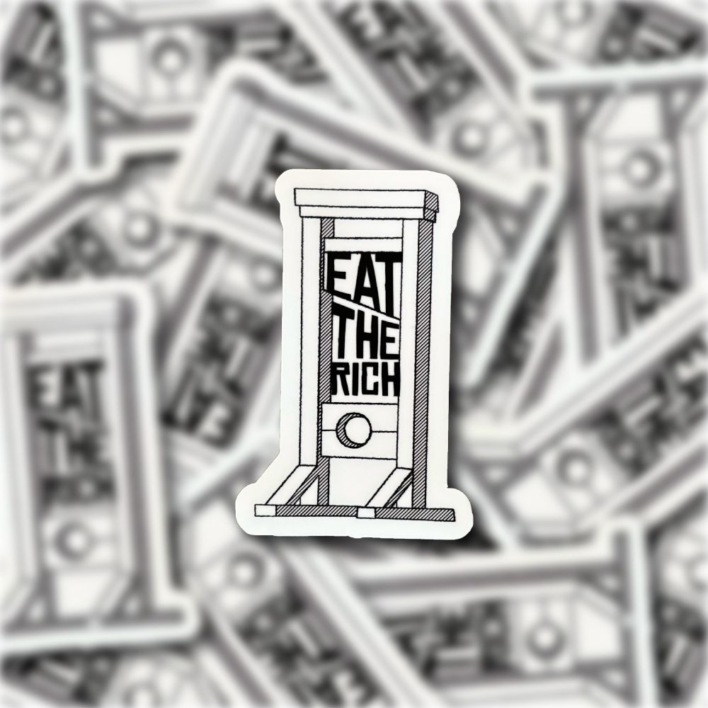 Guillotine with the words eat the rich

