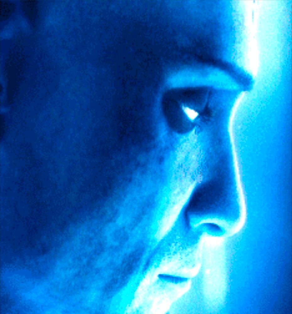 Dr. Manhattan looks sad