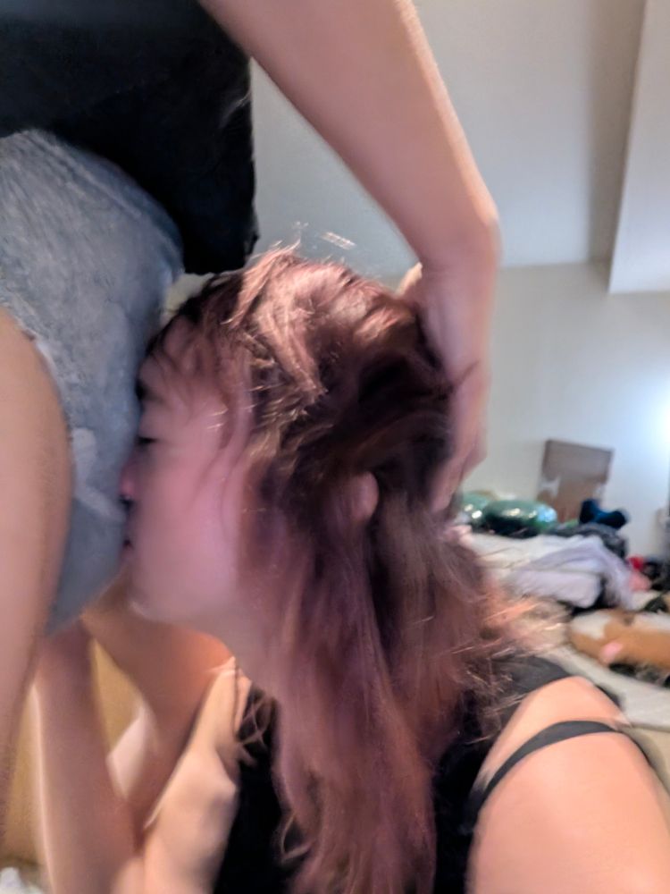 ekkos face is slammed into her Mommy's soaked pullup