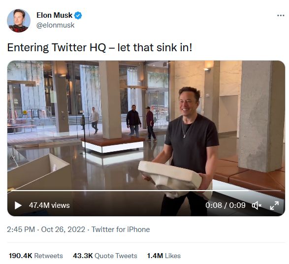 Screenshot of a tweet, from user @elonmusk from Oct 26 2022 on Twitter (now X), showing him the day he walked into Twitter HQ to begin the era of new ownership, carrying an actual sink, captioned “let that sink in”