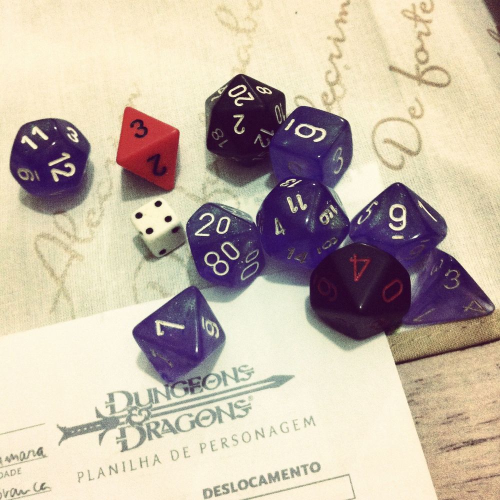 A bunch of multi-sided, multi-colored dice used to play the game Dungeons & Dragons.