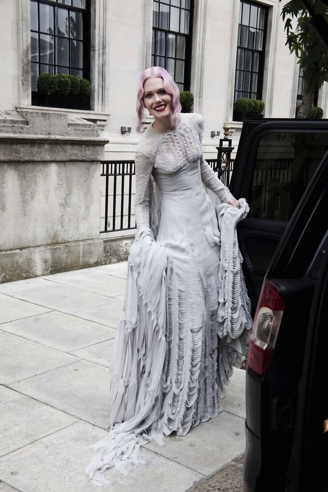 woman wearing an unusual grey cool toned wedding dress