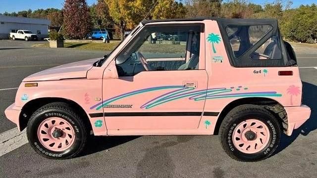 ADORABLE pink beachy looking suzuki sidekick (which is a geo tracker but not geo)