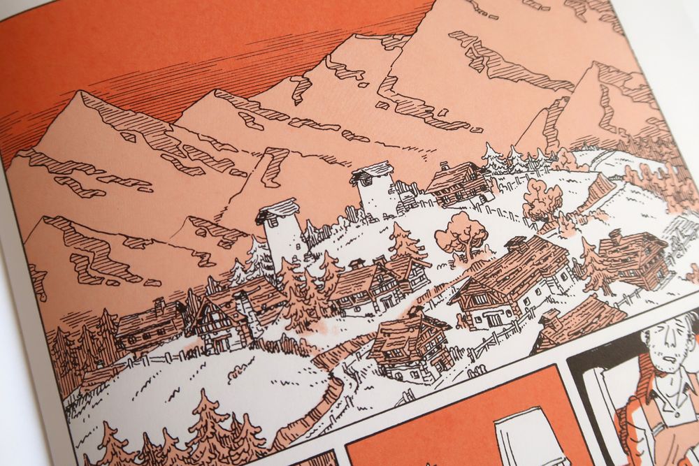 Photo of a comic panel, a small village, maybe in the alps.