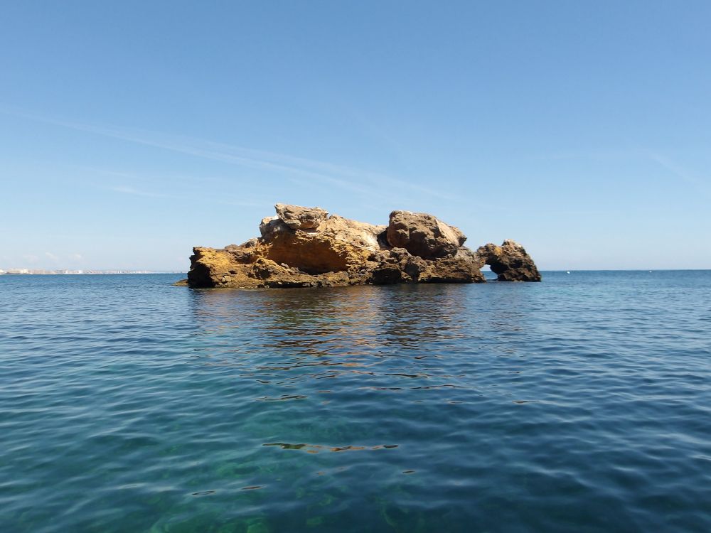 Large rock in the middle of the sea