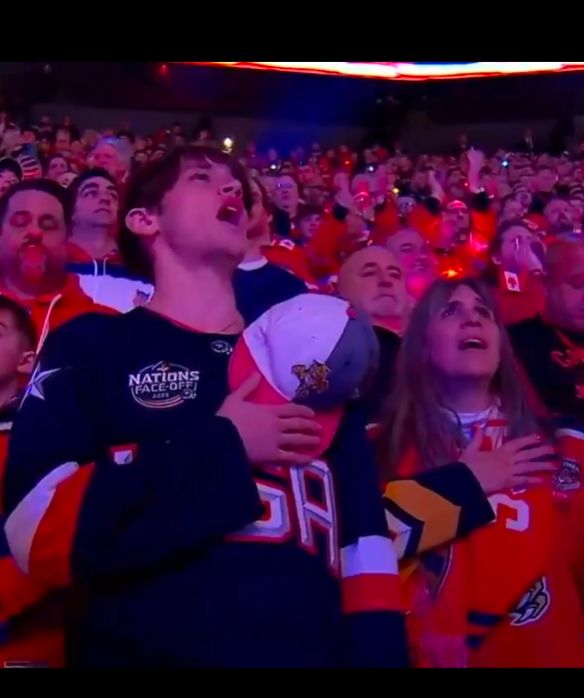 Fan of a hostile nation singing that nation's anthem
