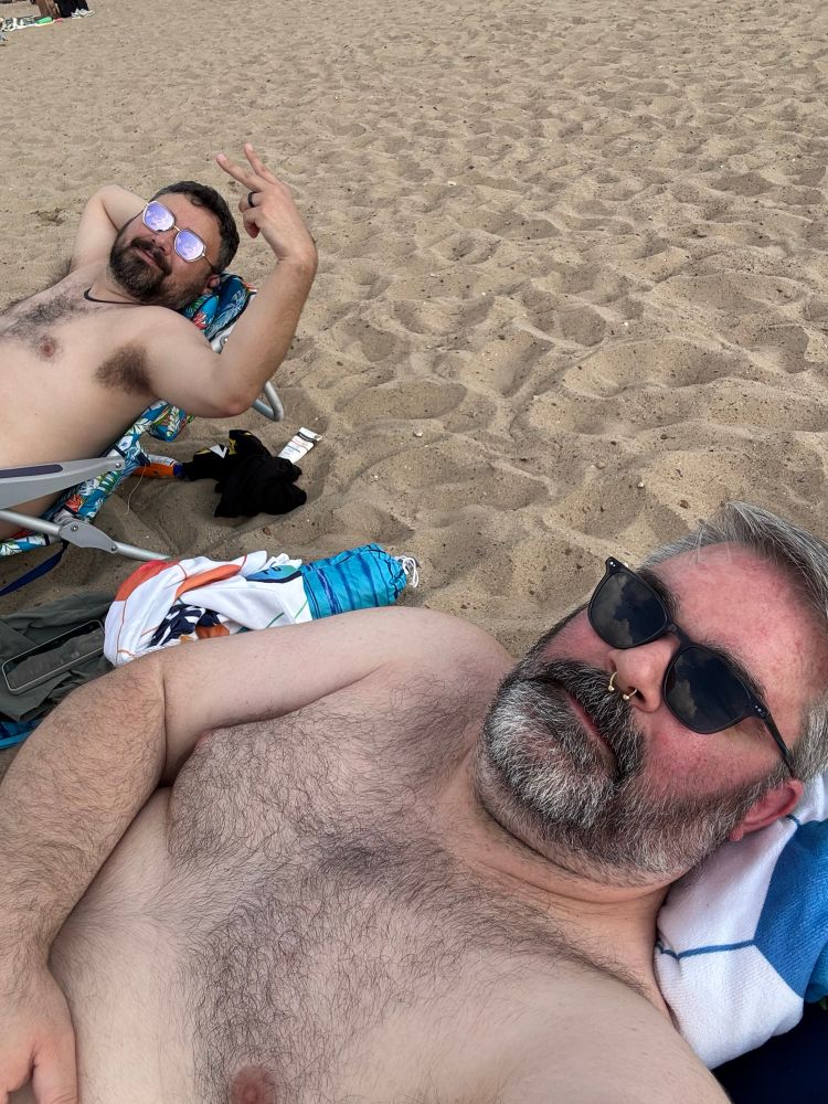 Me (foreground) and Otto (background) on gay beach. Vibing. Looking very cool. 