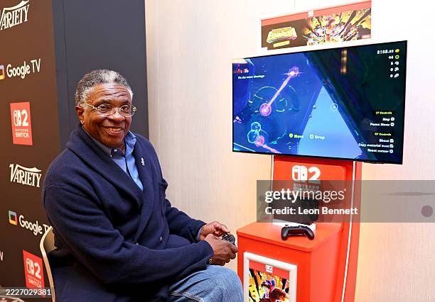 Keith David sitting at a switch 2 display and smiling warmly at the camera like he's having a good time
