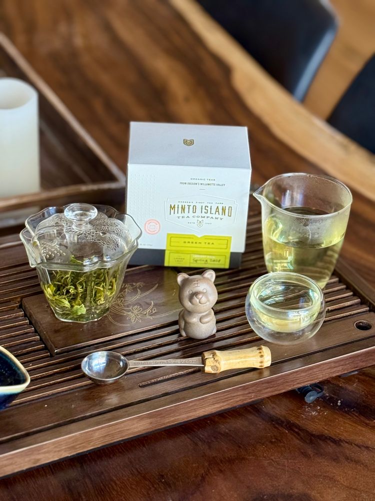 Shows a gongfu tea setup with green tea from Minto Island growers. 
