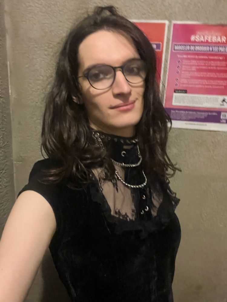 Me in a black witch dress and necklace just slaying 