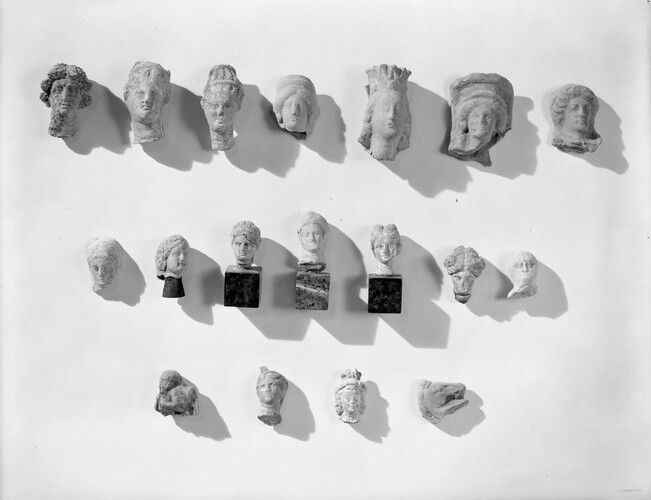 Small head of a horse, broken off above chest.  Horse is in profile, back in flat and unmodeled.  Mane is indicated with straight incised lines.  Muscles of jaw and mouth prominent.
Pale, reddish brown clay.

Harvard Art Museums/Arthur M. Sackler Museum, Gift of the Misses Norton