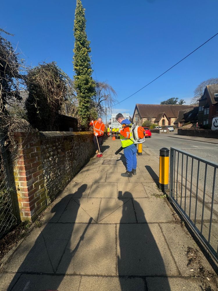Sweeping and blowing on footpath