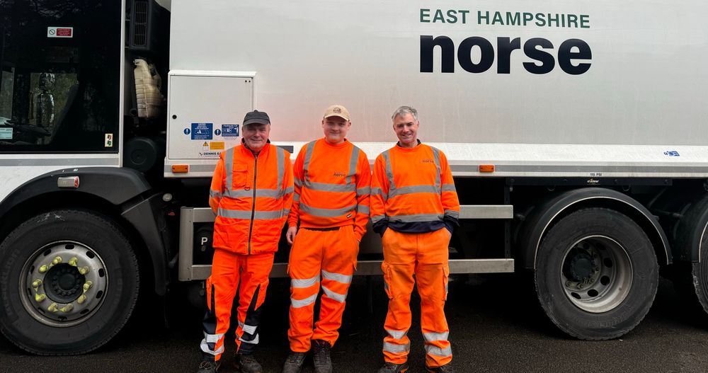Recycling crew standing in front of their lorry