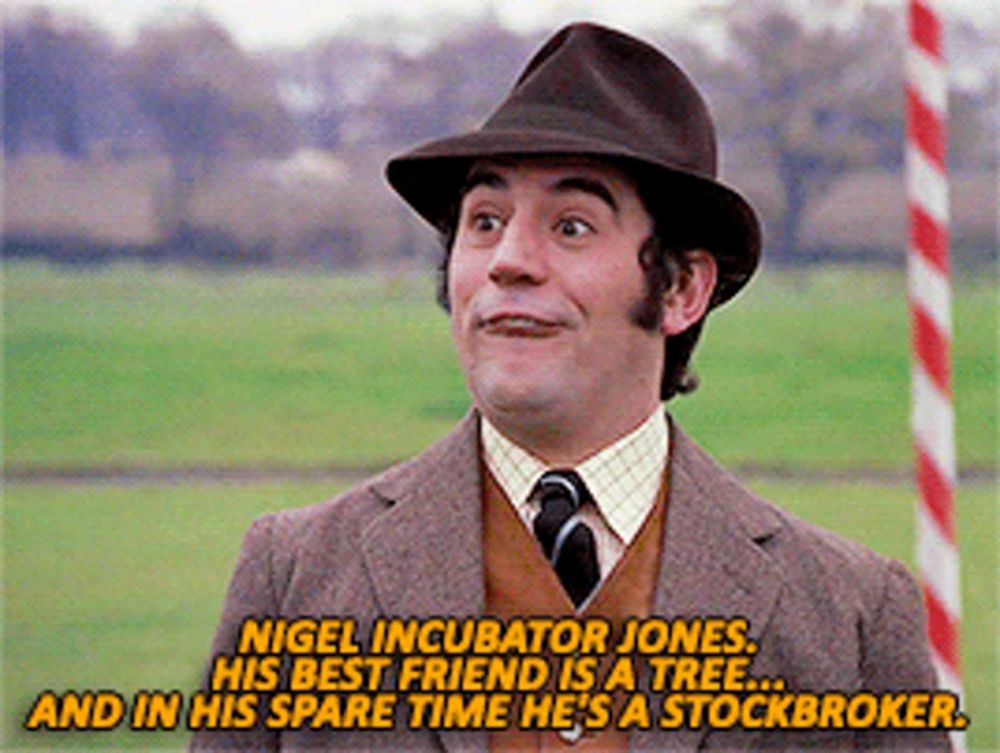 a man in a suit and hat is saying nigel incubator jones his best friend is a tree