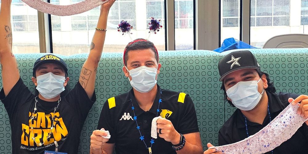 MD Anderson patients, staff and volunteers at a Fourth of July celebration.
