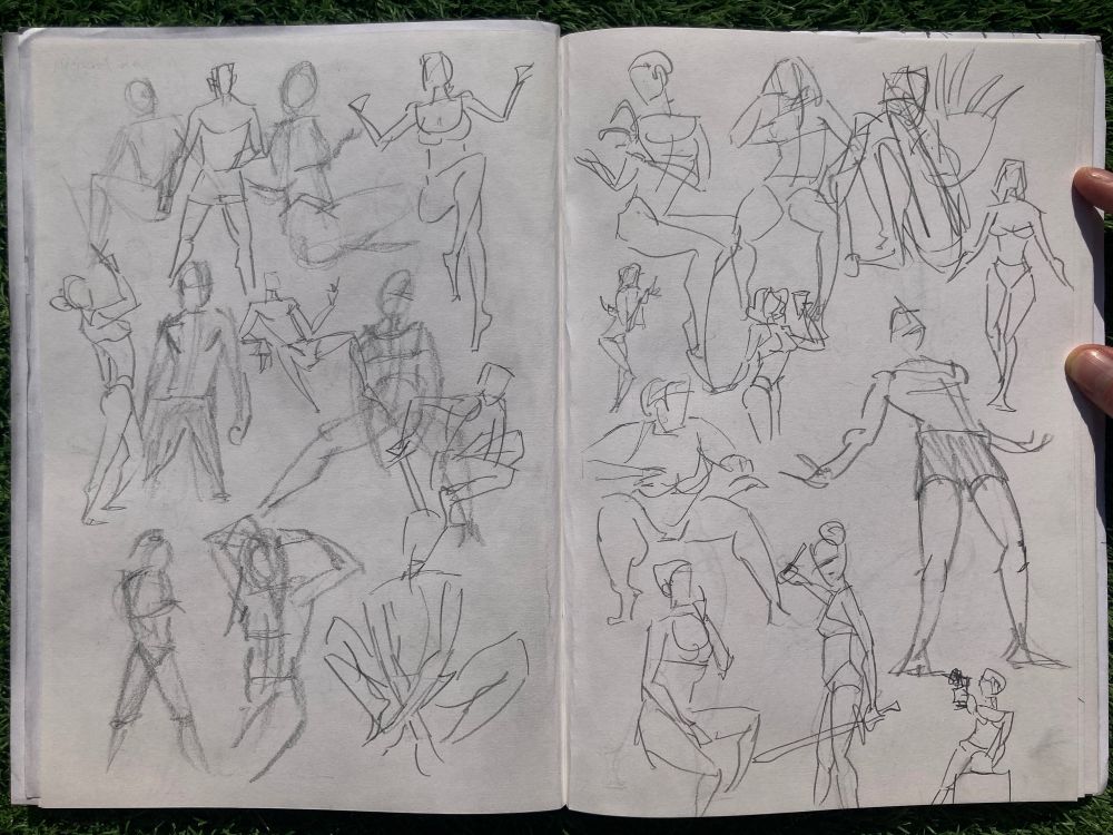 Quick gesture drawings of figures in different poses.