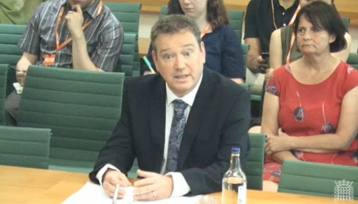 A screengrab from the video recording, showing Professor Donal Wall sat at a desk providing expert oral evidence to the House of Commons committee.