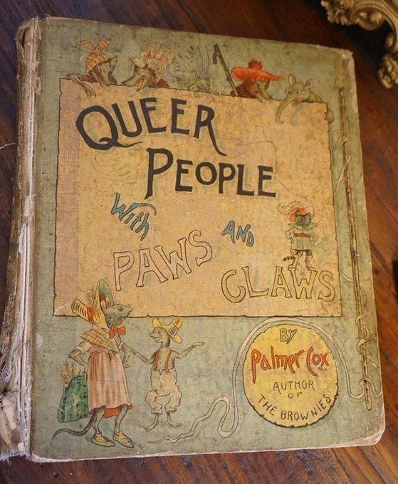 A pic of a book titled Queer People with Paws and Claws” by Palmer Cox, Author of The Brownies.