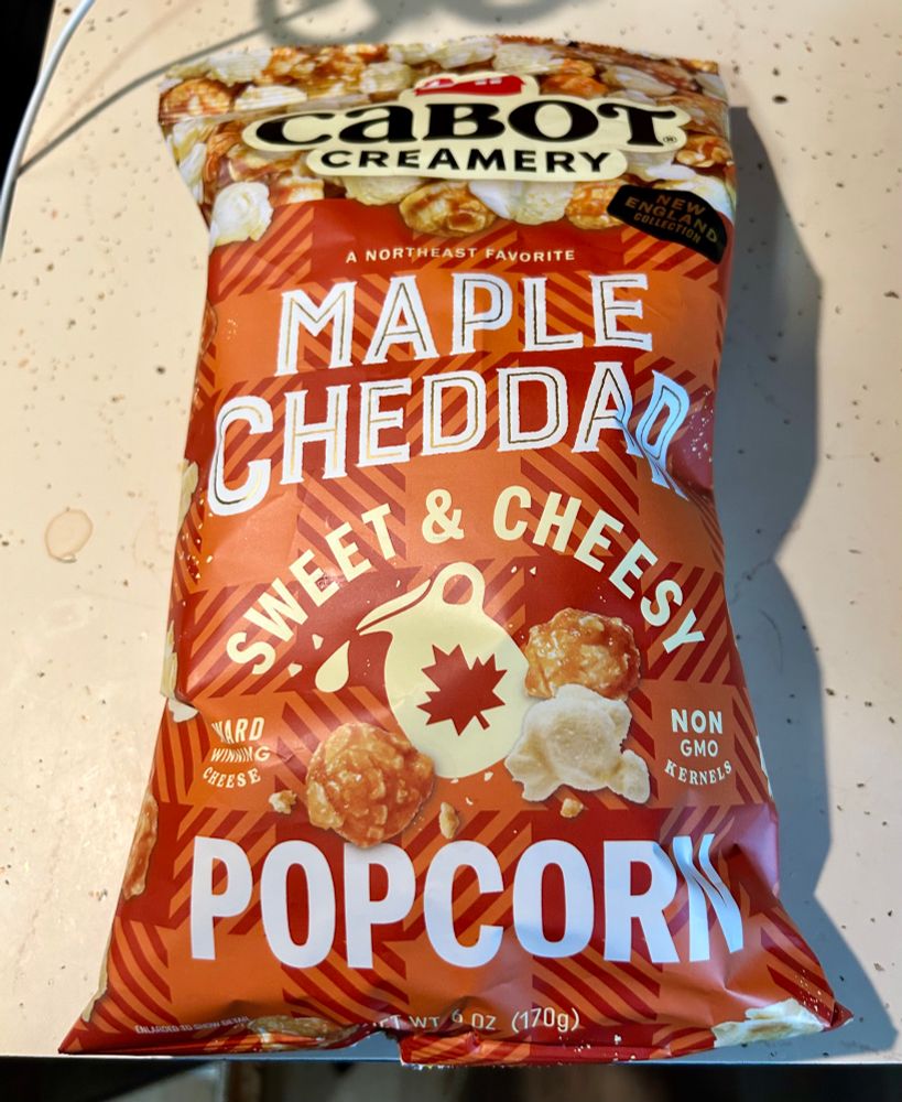 A bag of Cabot Creamery Maple Cheddar Sweet & Cheesy Popcorn 