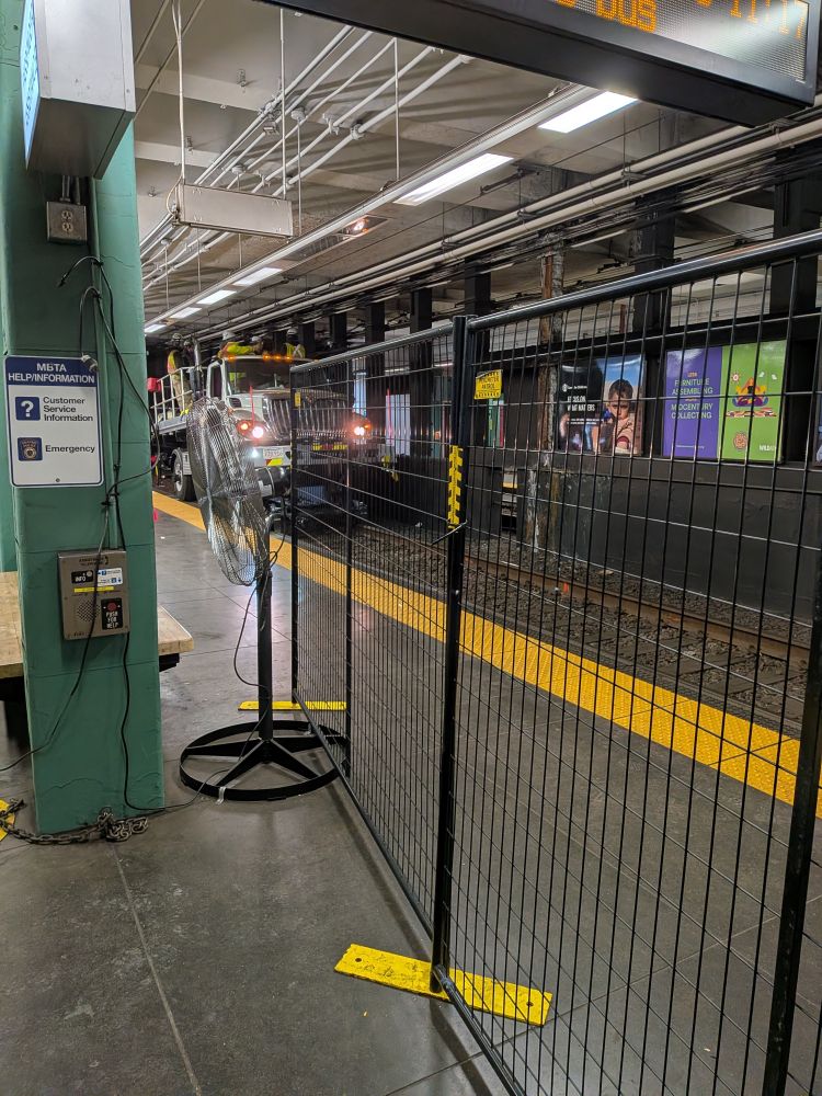 mbta contractor hi-rail service truck on the green line tracks at Kenmore Station 