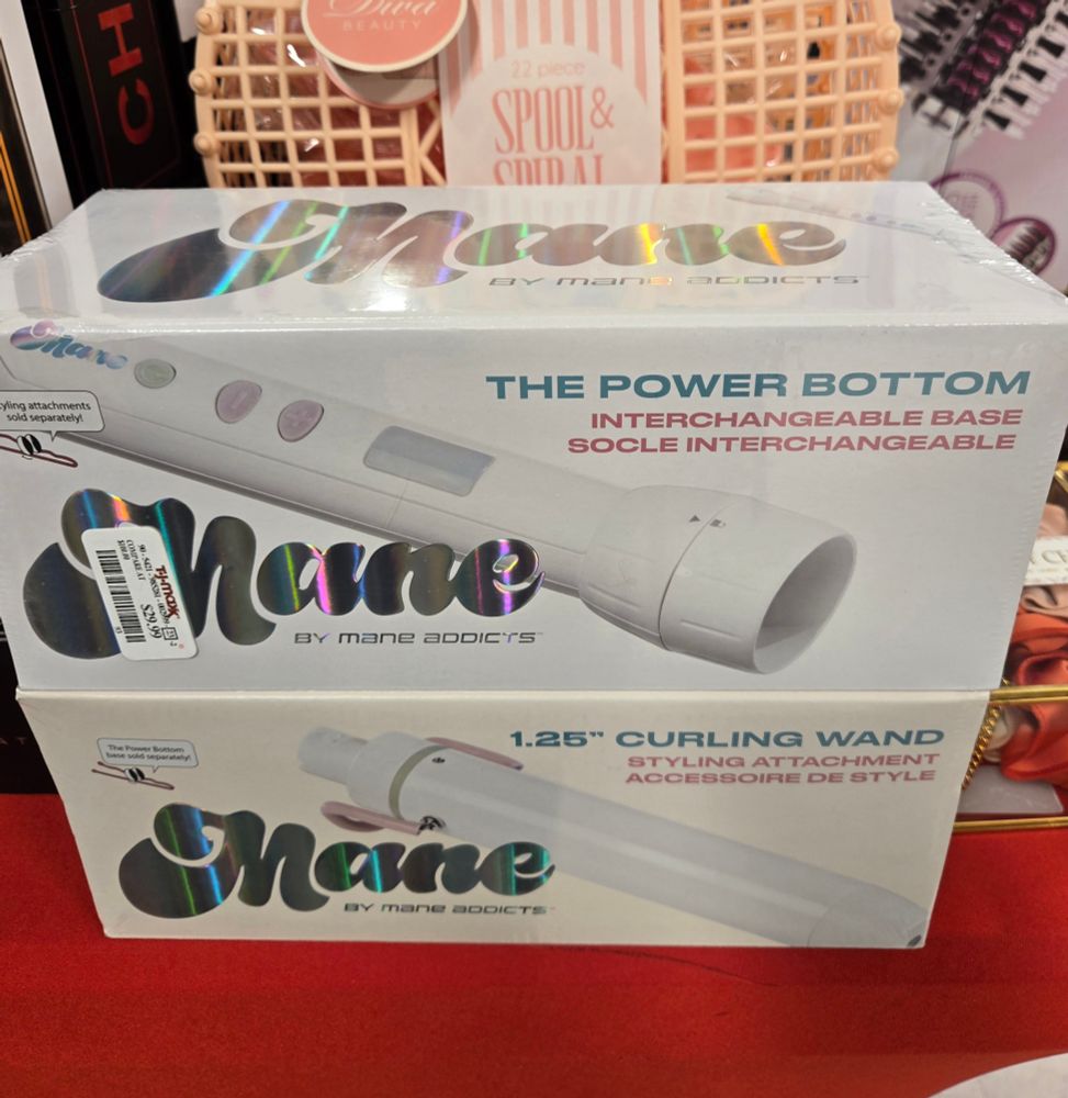 A hair curling iron called "The Power Bottom"