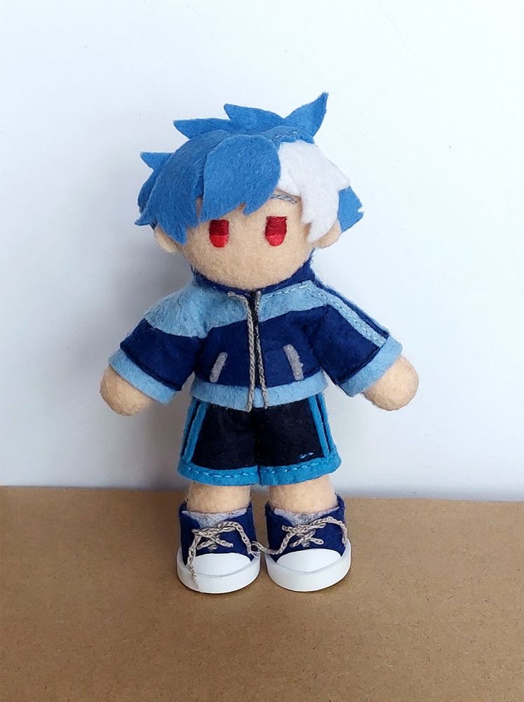 A felt plushie of an original character