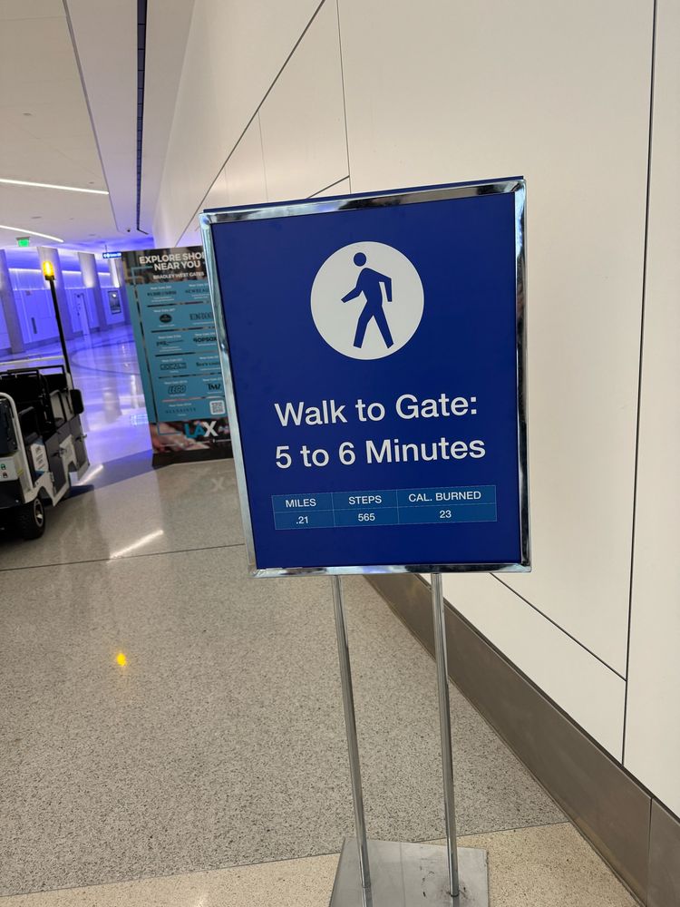Sign telling you how many calories you’ll burn and steps you’ll get on the way to your airport gate 