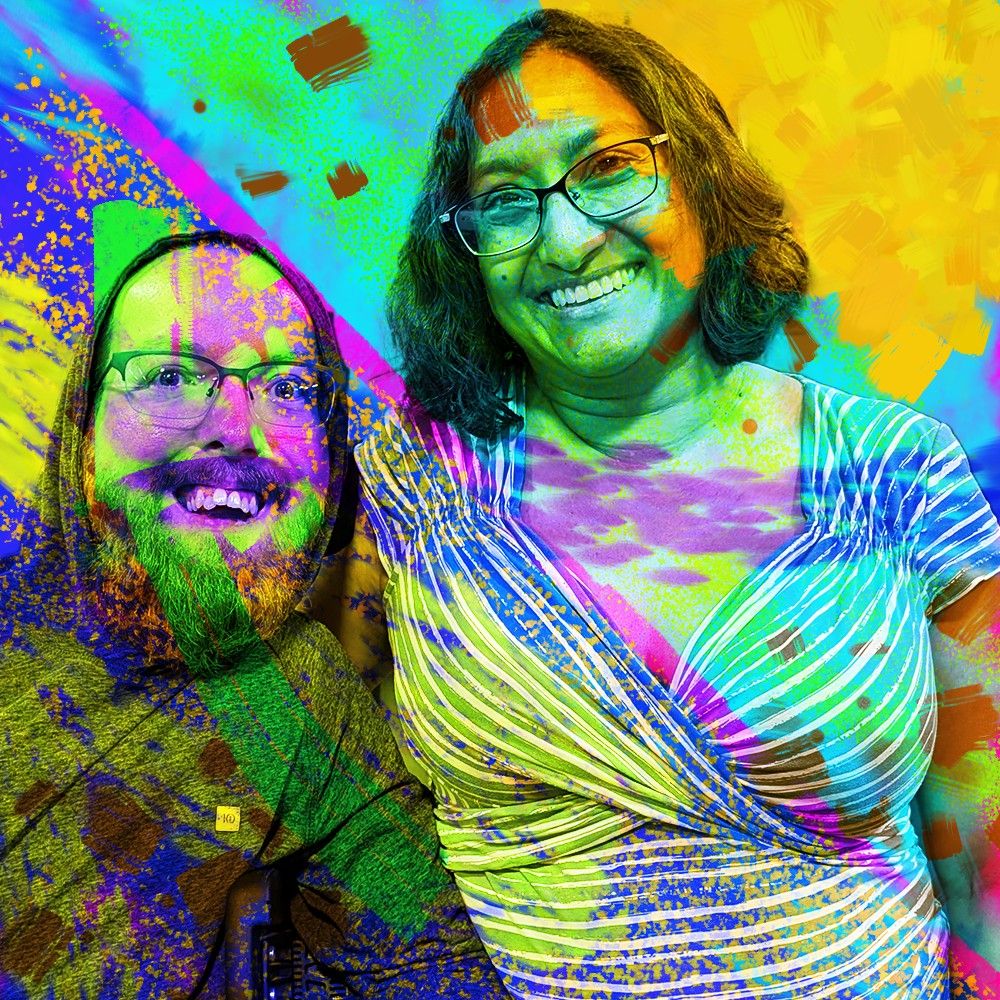 Digital art of an abstract, colorful portrait of beautiful Bengali woman standing next to a man with short brown hair, a full beard, and wearing eyeglasses. Both are smiling.