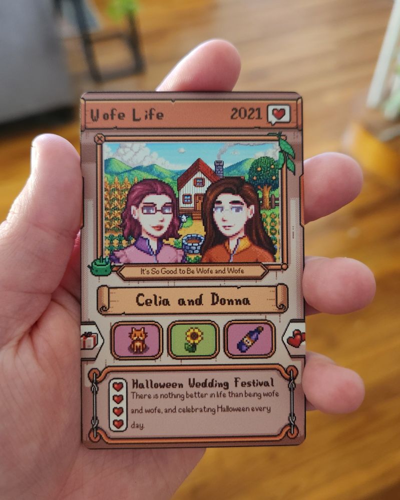 A custom metal card of two women in the style of Stardew Valley.