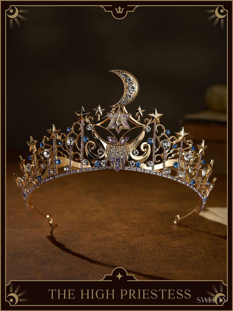 The high priestess tiara with a crescent moon sticking out the top all magical and cool