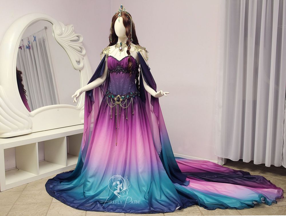 A beautiful fantasy gown in purple, pink and blues. Sweeping out at the back for ghost running through the halls of Bluesky.

