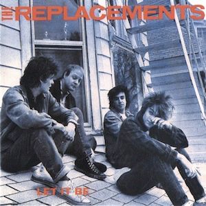 The cover of The Replacements album, “Let It Be,” which features the four members of the band sitting on a rooftop outside a window. 