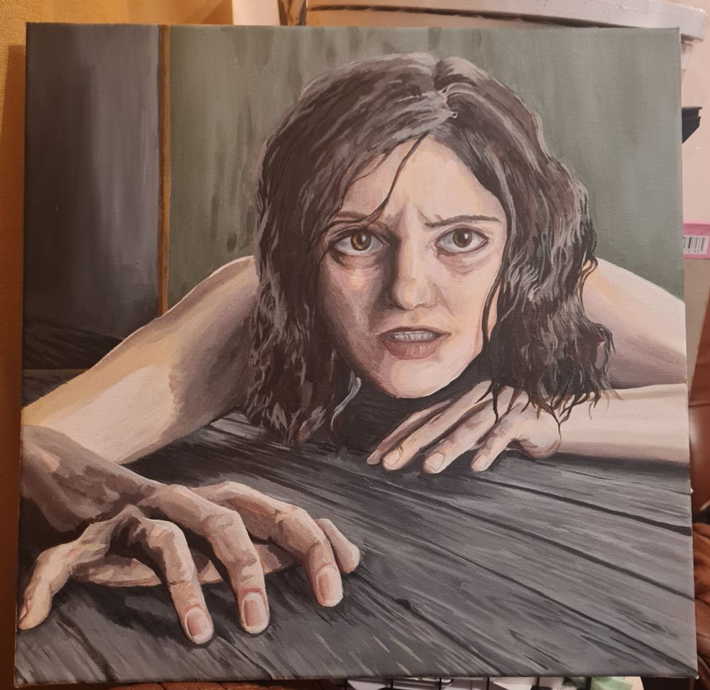 Painting on a canvas of a brunette woman's face, arms and hands as she crawls toward the viewer. 